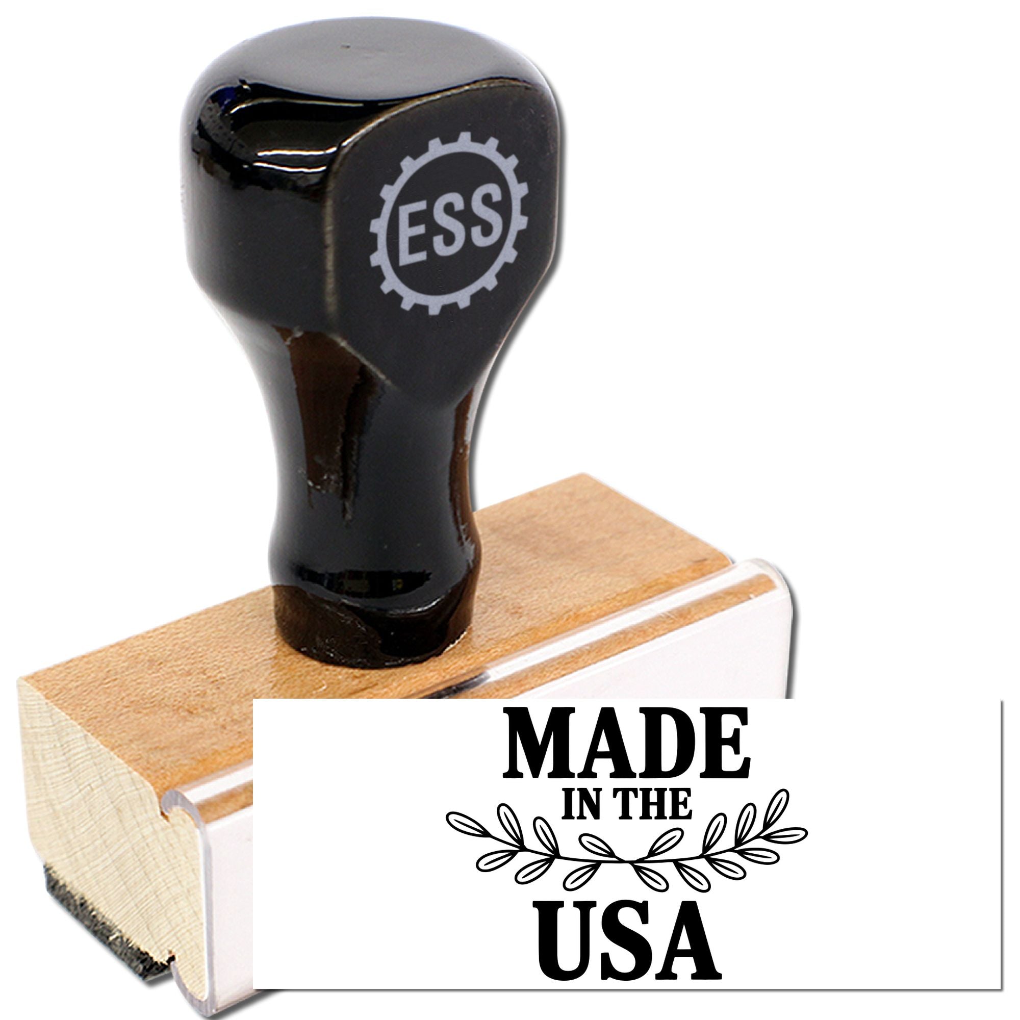 Black ESS rubber stamp on wooden base, creating a white Made in the USA seal.