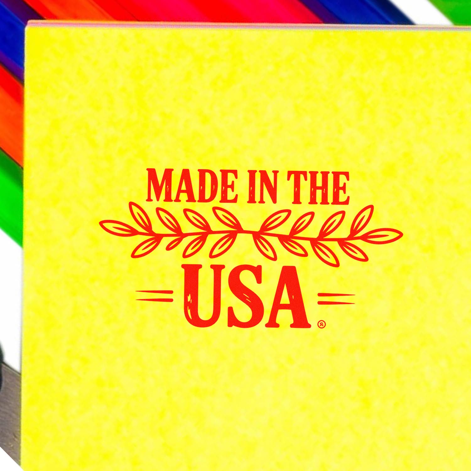 Yellow stamp and seal product box with red Made in the USA lettering and rainbow-colored edges.