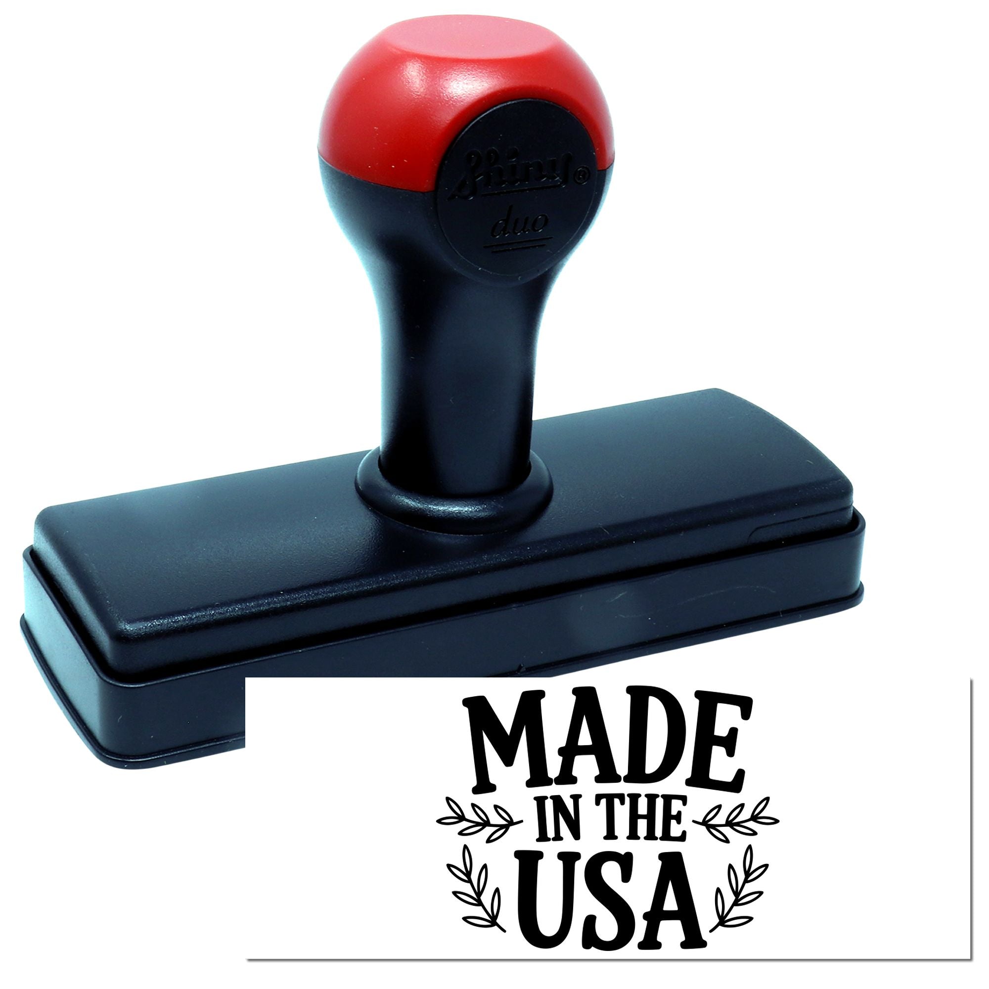 Red and black self-inking stamp and seal with round handle and Made in the USA imprint