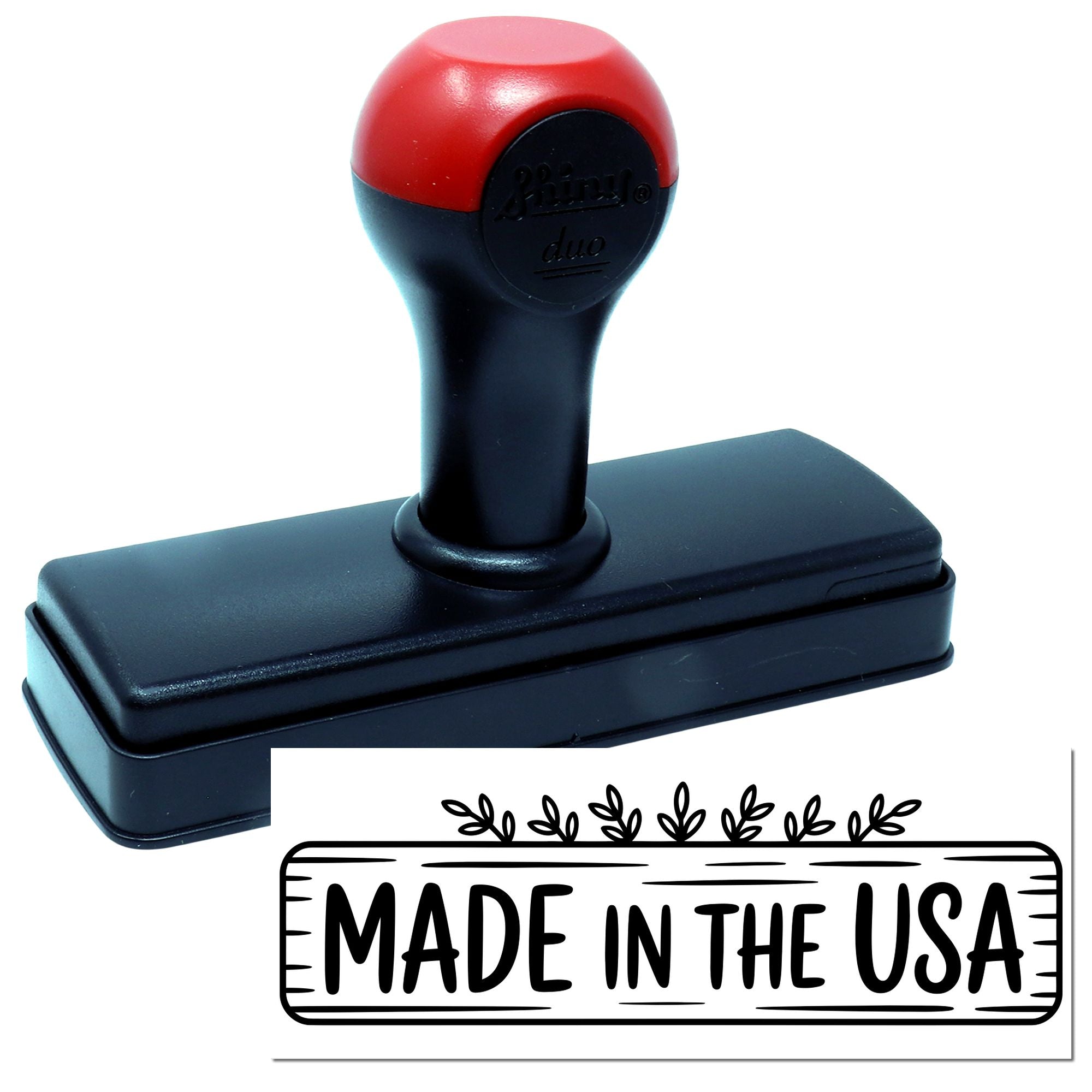 Red and black self-inking stamp with "Made in the USA" seal and rectangular base on a white background.