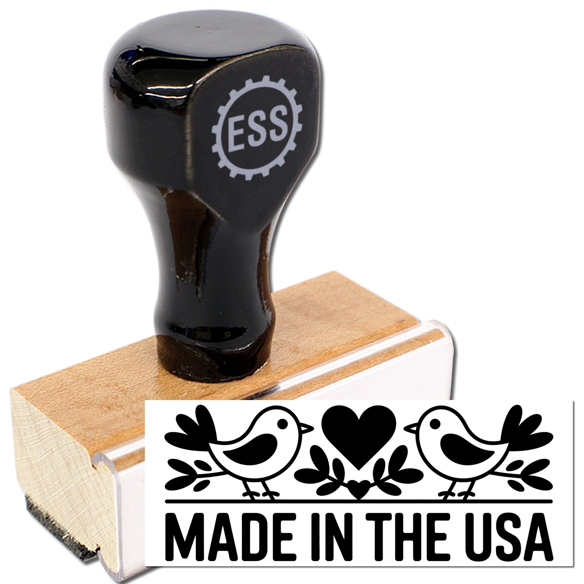 Black ESS rubber stamp seal on wood block with Made in the USA bird-and-heart design