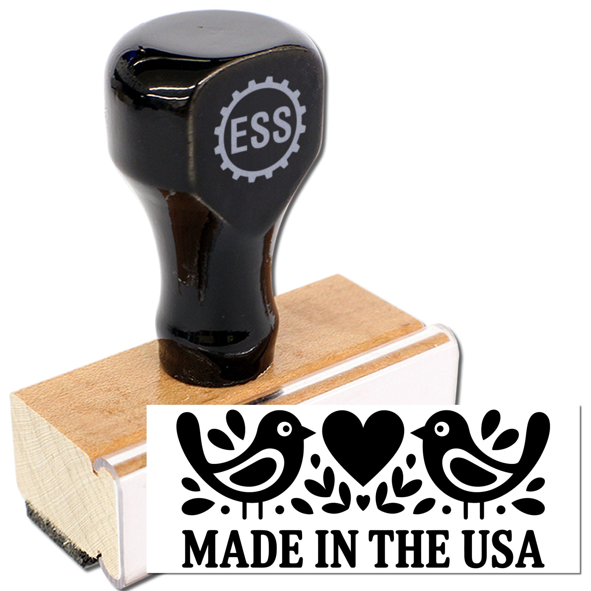 Black ESS rubber stamp with wooden handle and "Made in the USA" seal design, birds and heart.