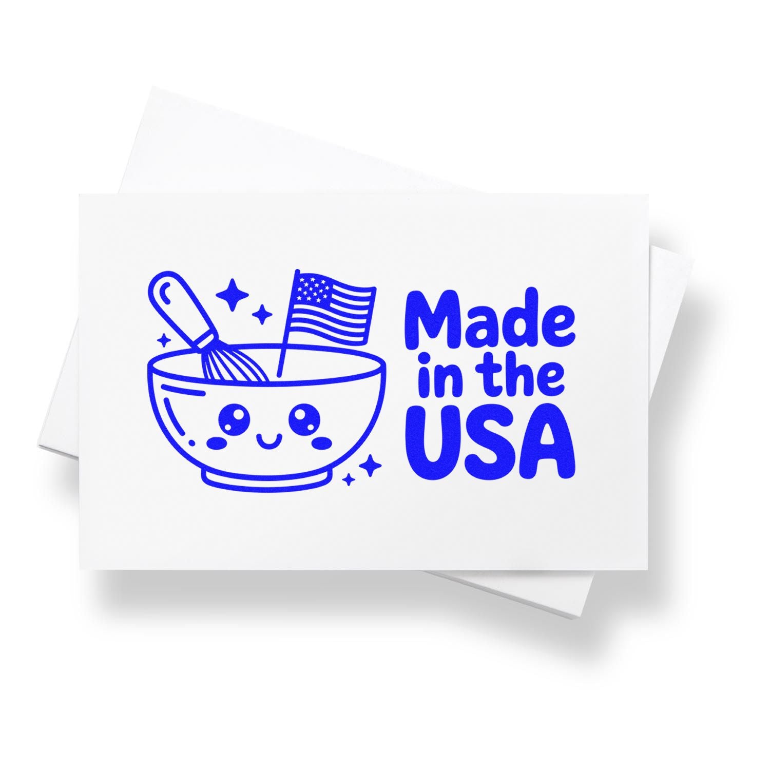 Blue Made in the USA stamp design with smiling bowl, whisk, and American flag on a white card