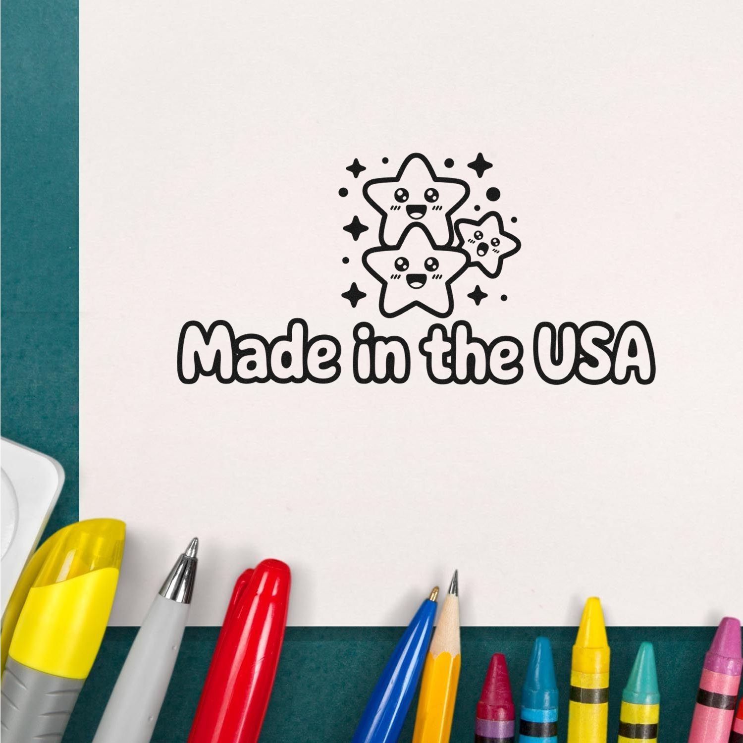 Made in the USA stamp and seal with smiling star characters in black ink on white paper, framed by colorful pens.
