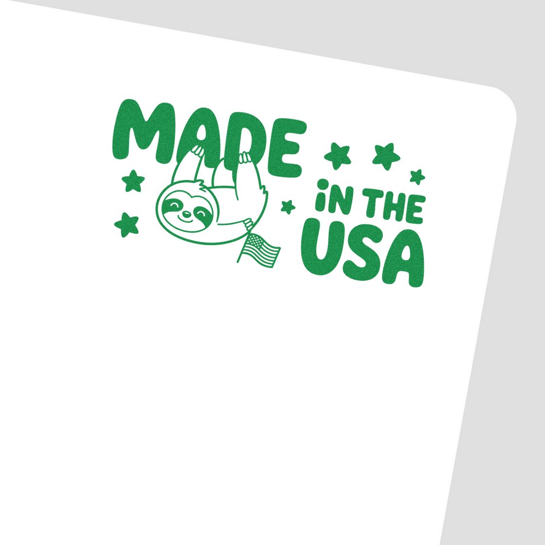 Green Made in the USA sloth stamp and seal with stars and a small American flag.