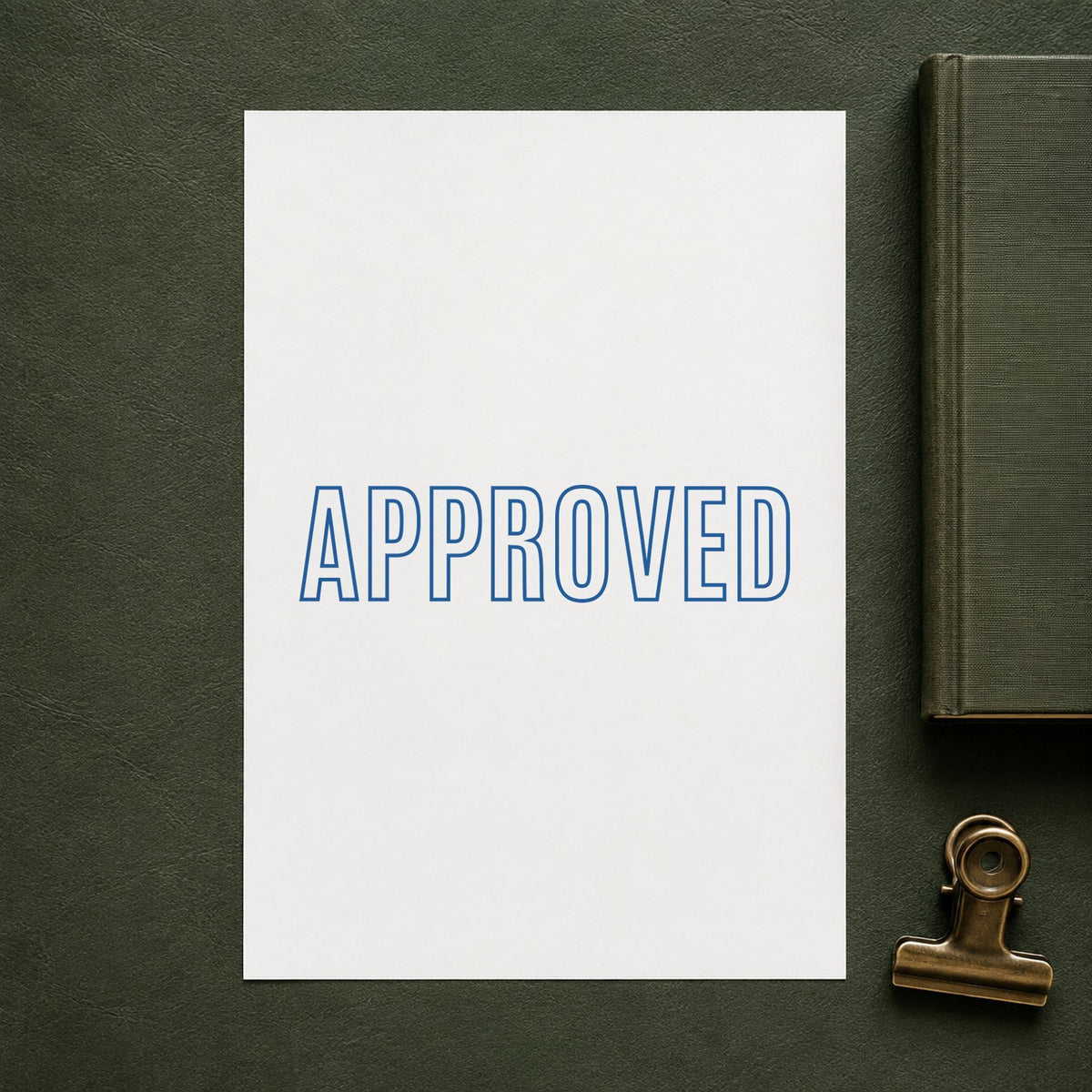 Pre-inked "Approved" stamp applied to a document, 1/2 x 1-5/8 in impression