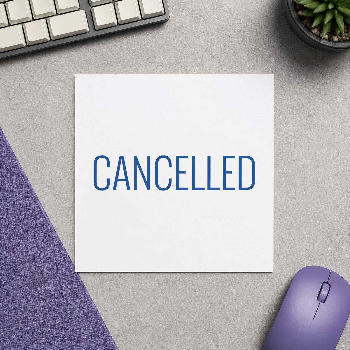 "Cancelled" stamp pressed on paper, no separate ink pad needed
