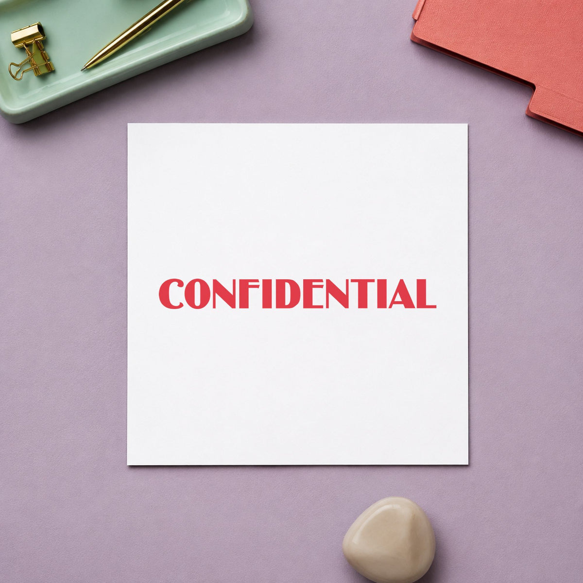 Pre-inked "Confidential" stamp applied to a document, 1/2 x 1-5/8 in impression