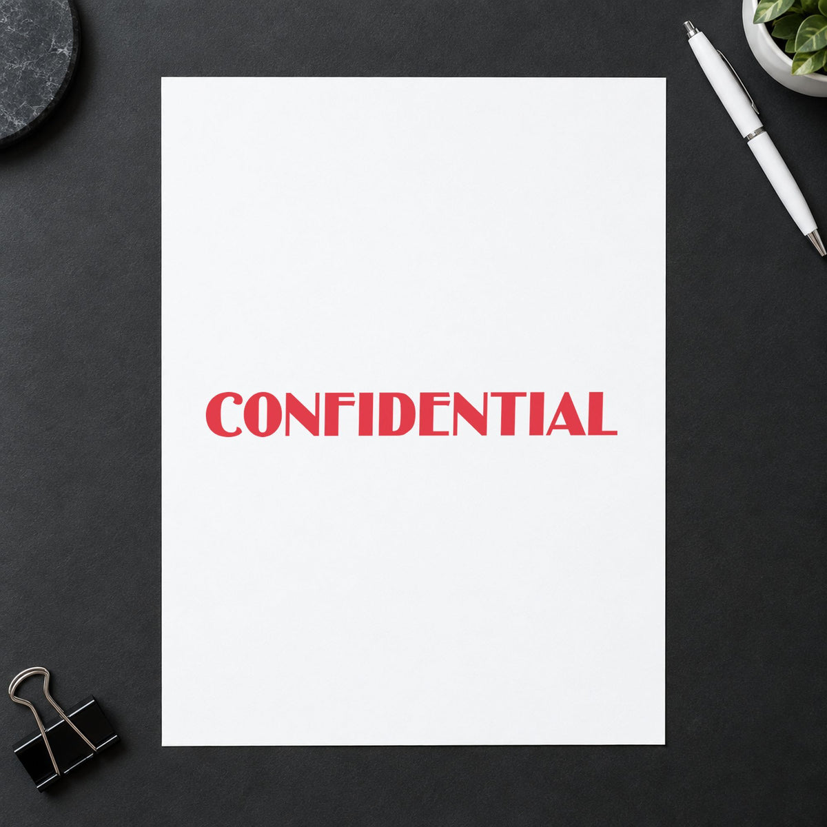 Close view of the "Confidential" mark left by Xstamper No. 1150