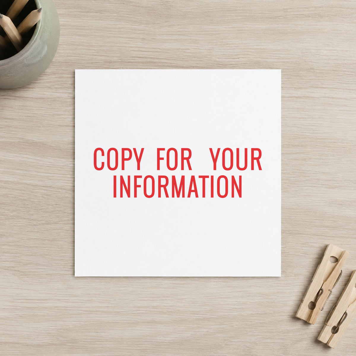 "Copy for your information" Xstamper stamp in use on paper, Approximately 1/2 in tall x 1-5/8 in wide rectangle imprint