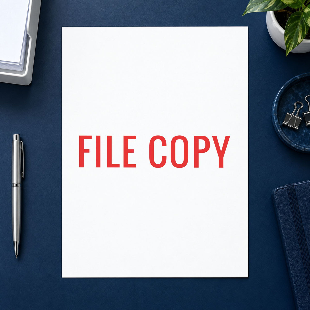 "File copy" stamp pressed on paper, no separate ink pad needed