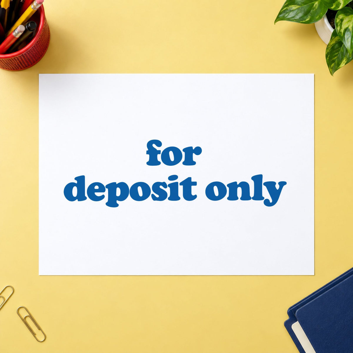 "For deposit only" stamp pressed on paper, no separate ink pad needed