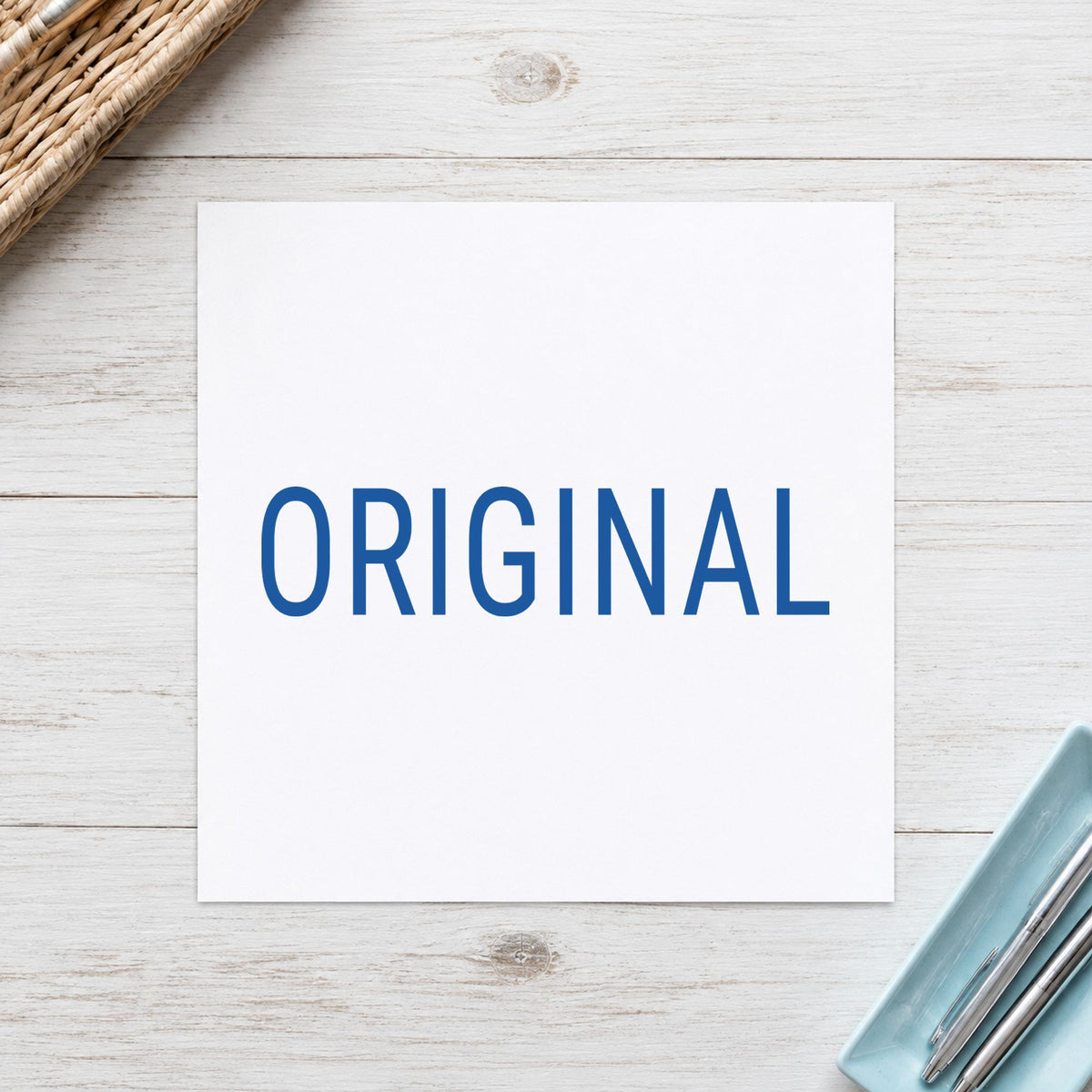 "Original" stamp pressed on paper, no separate ink pad needed
