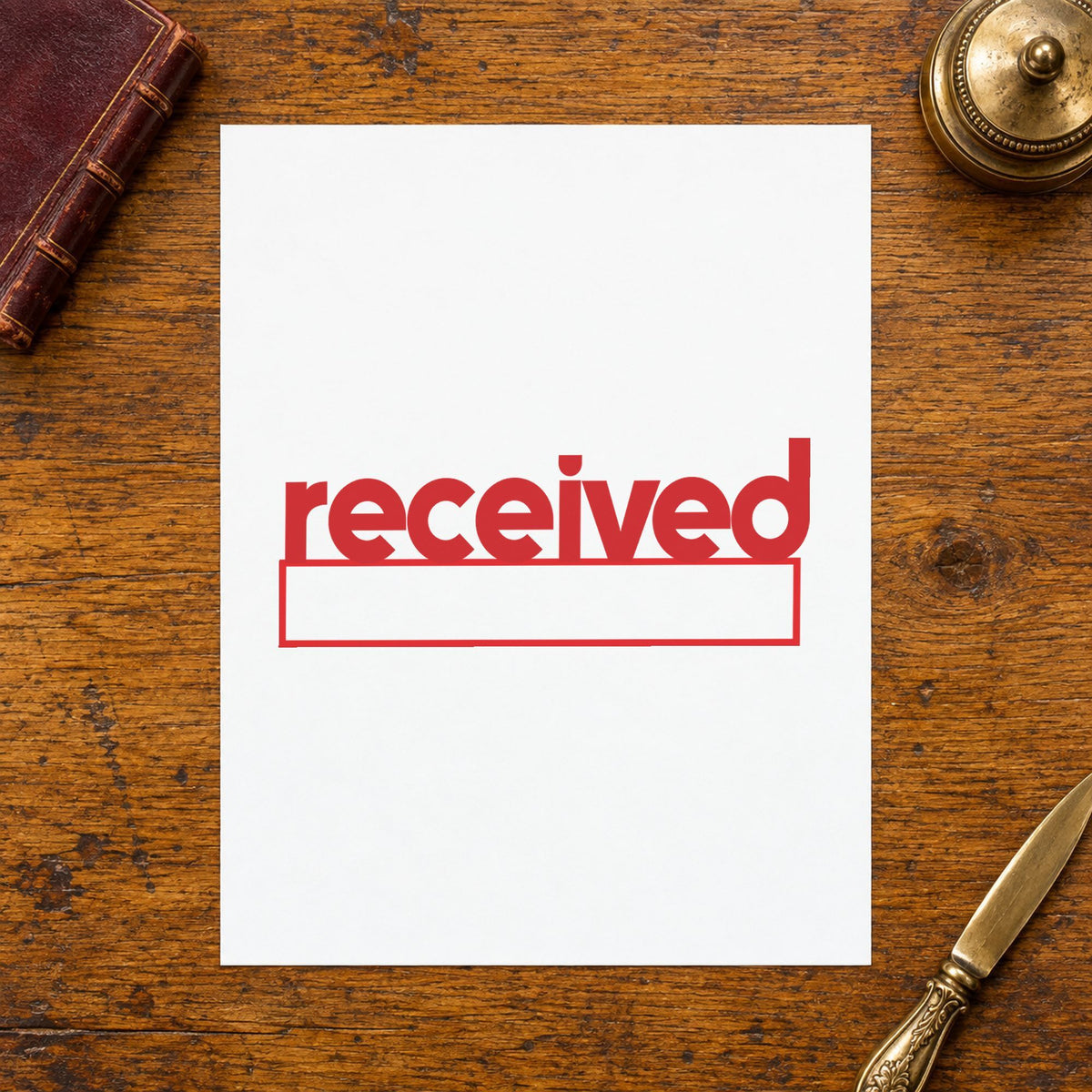 "Received" stamp pressed on paper, no separate ink pad needed