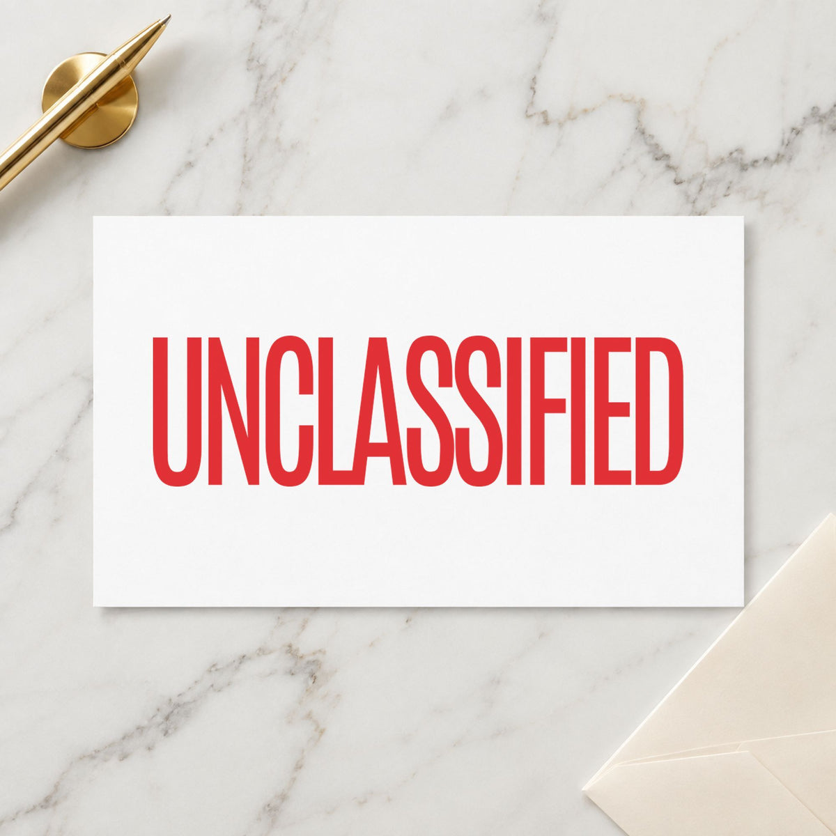 "Unclassified" Xstamper No. 1042 stamp shown in everyday handling