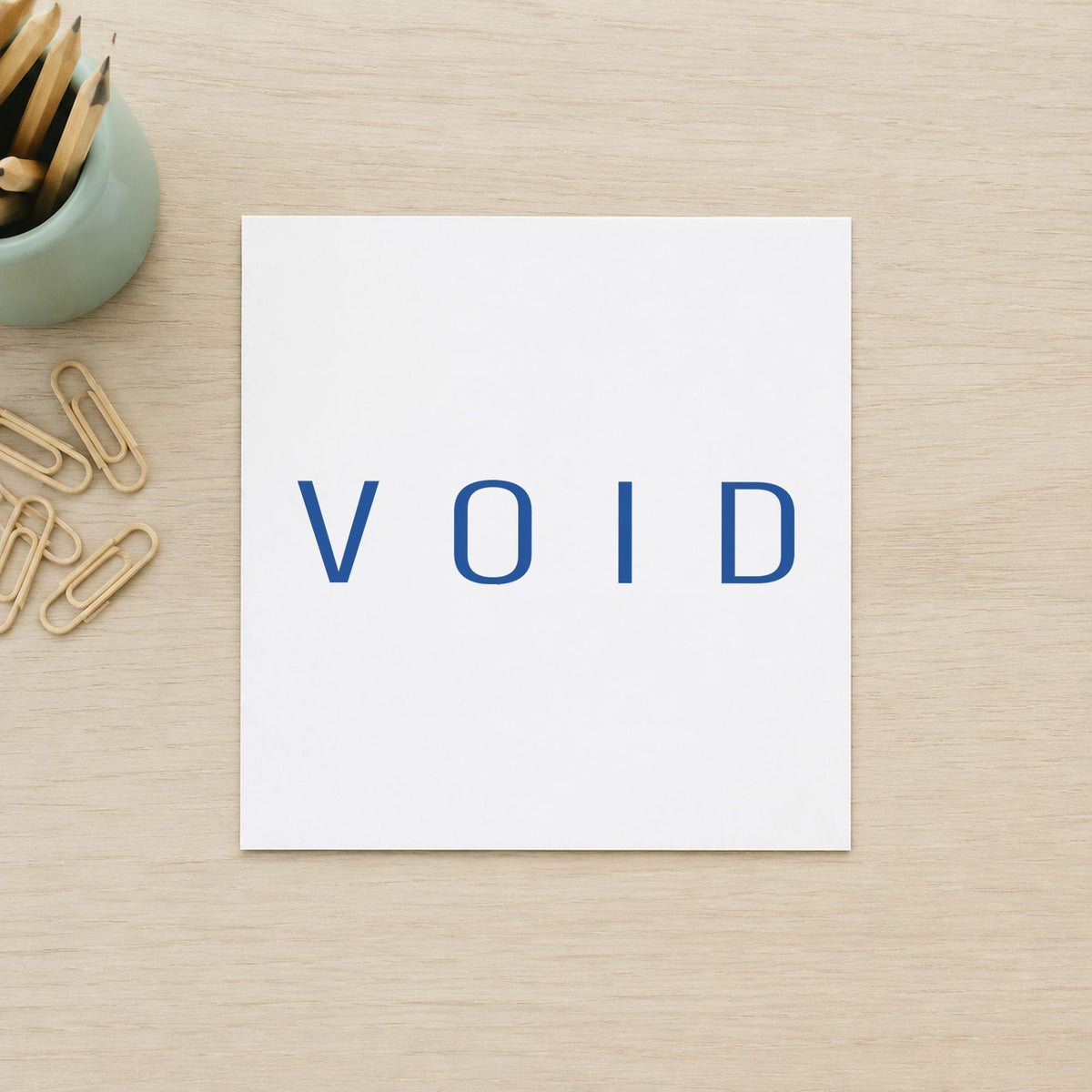 "Void" stamp pressed on paper, no separate ink pad needed