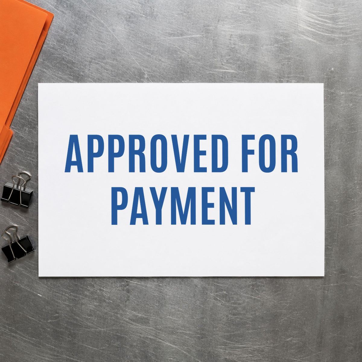 "Approved for payment" Xstamper stamp in use on paper, 1/2 x 1-5/8 in rectangle imprint