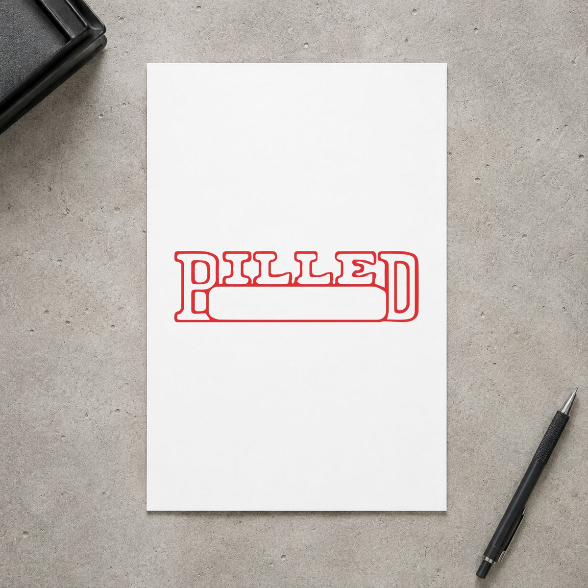 "Billed" Xstamper stamp in use on paper, Approximately 1/2 in tall x 1-5/8 in wide rectangle imprint