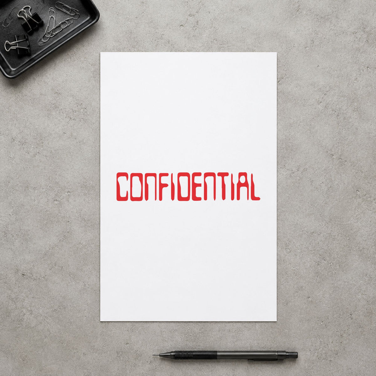 "Confidential" stamp pressed on paper, no separate ink pad needed
