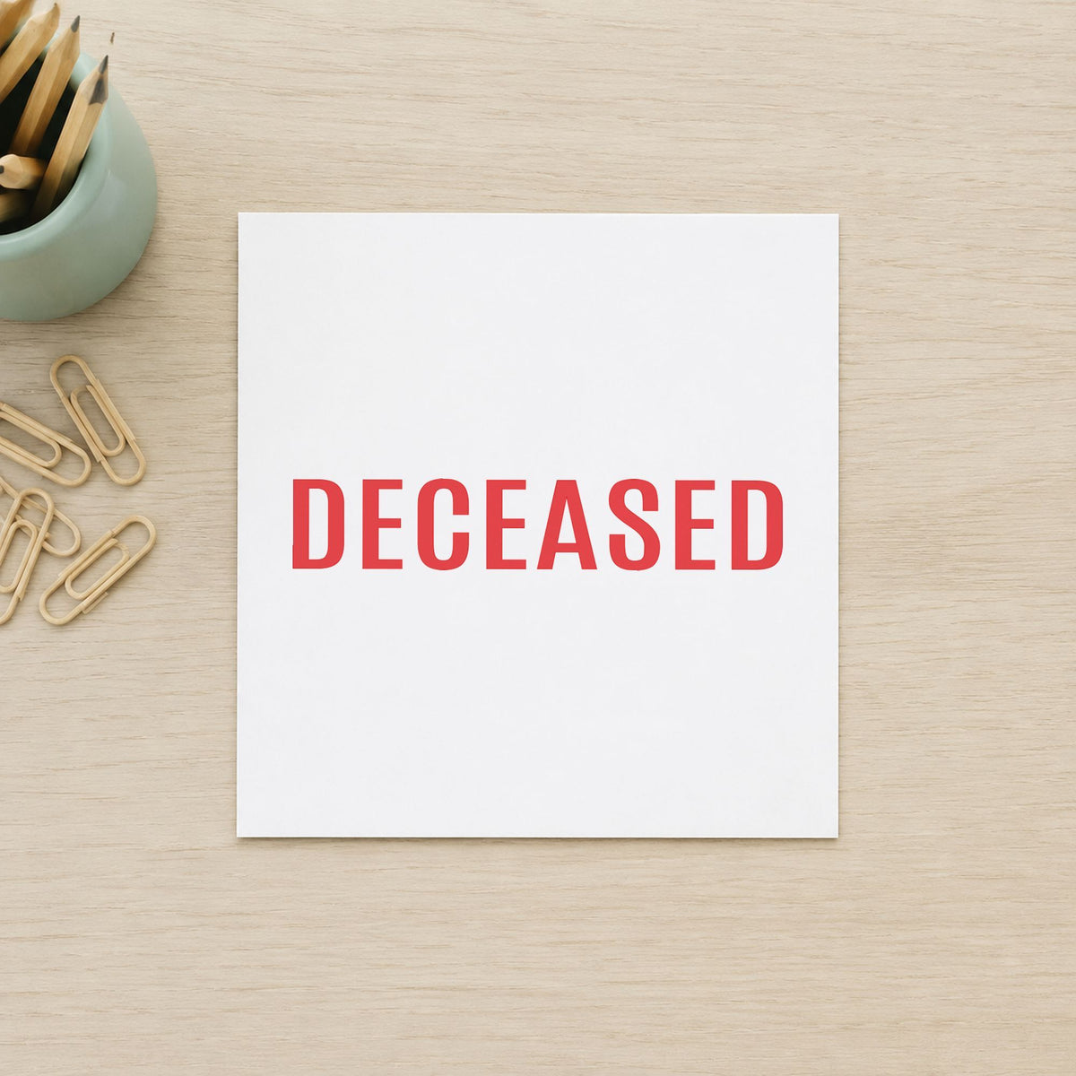 "Deceased" imprint sized 1/2 x 1-5/8 in on a document page