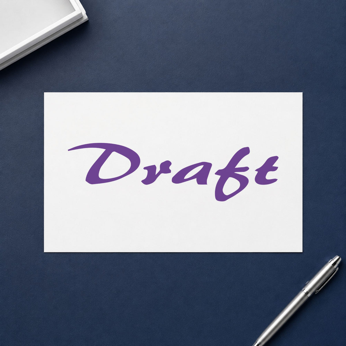 "Draft" Xstamper stamp in use on paper, 1/2 x 1-5/8 in rectangle imprint