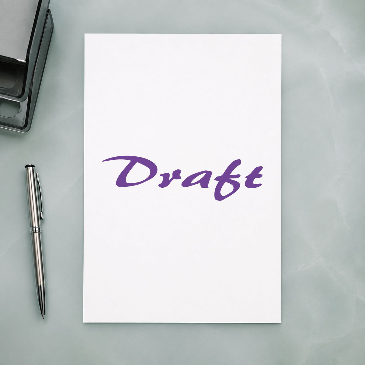 "Draft" Xstamper pre-inked stamp beside its rectangle imprint
