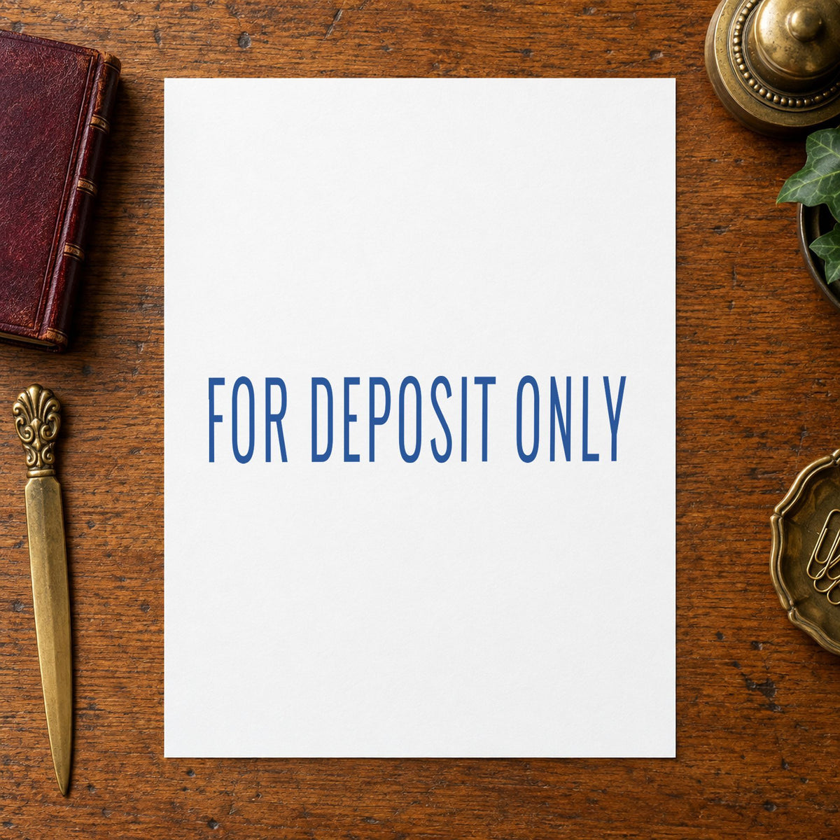 "For deposit only" stamp pressed on paper, no separate ink pad needed