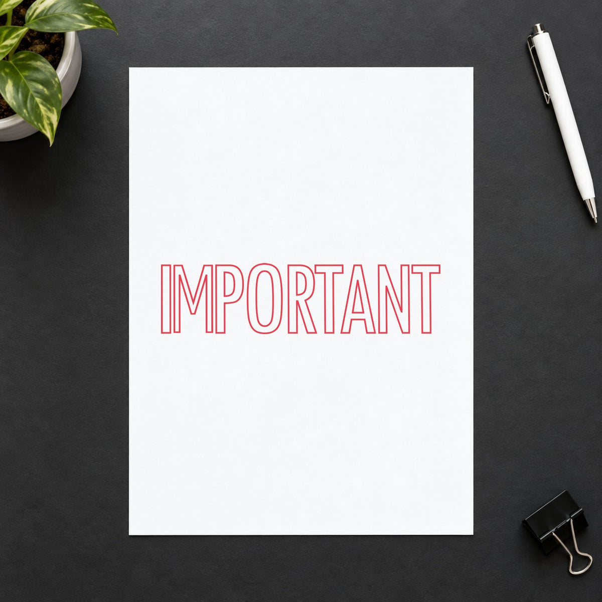 "Important" Xstamper pre-inked stamp beside its rectangle imprint