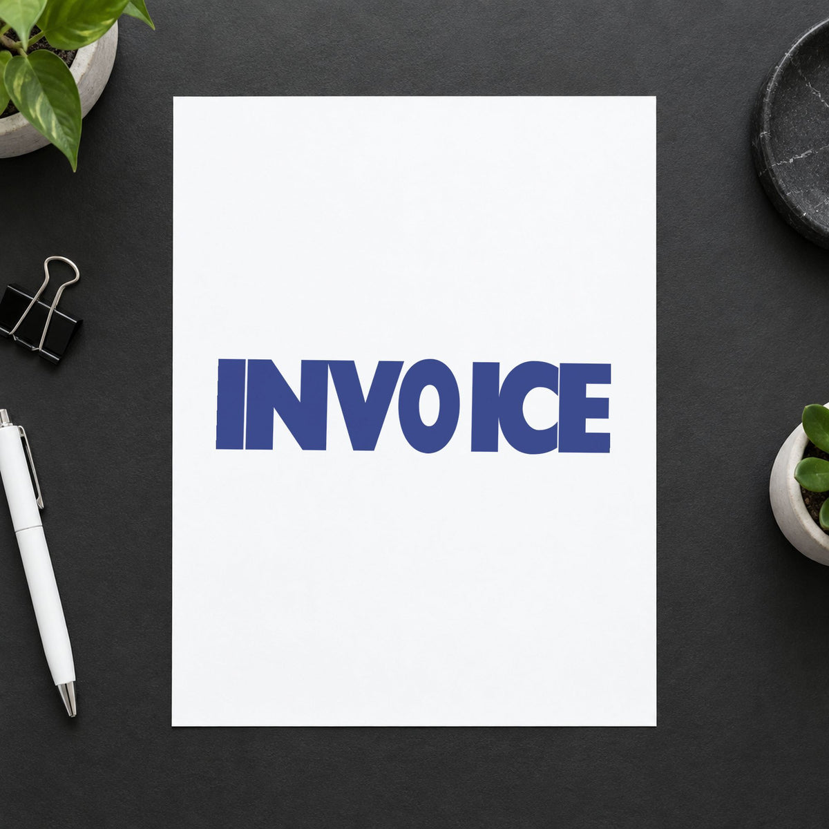 "Invoice" stamp pressed on paper, no separate ink pad needed