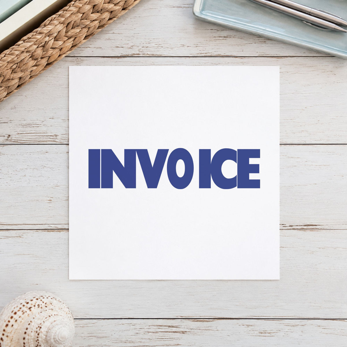 "Invoice" Xstamper pre-inked stamp beside its rectangle imprint
