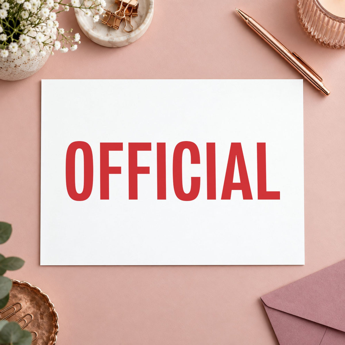 Pre-inked "Official" stamp marking paperwork in an office setting
