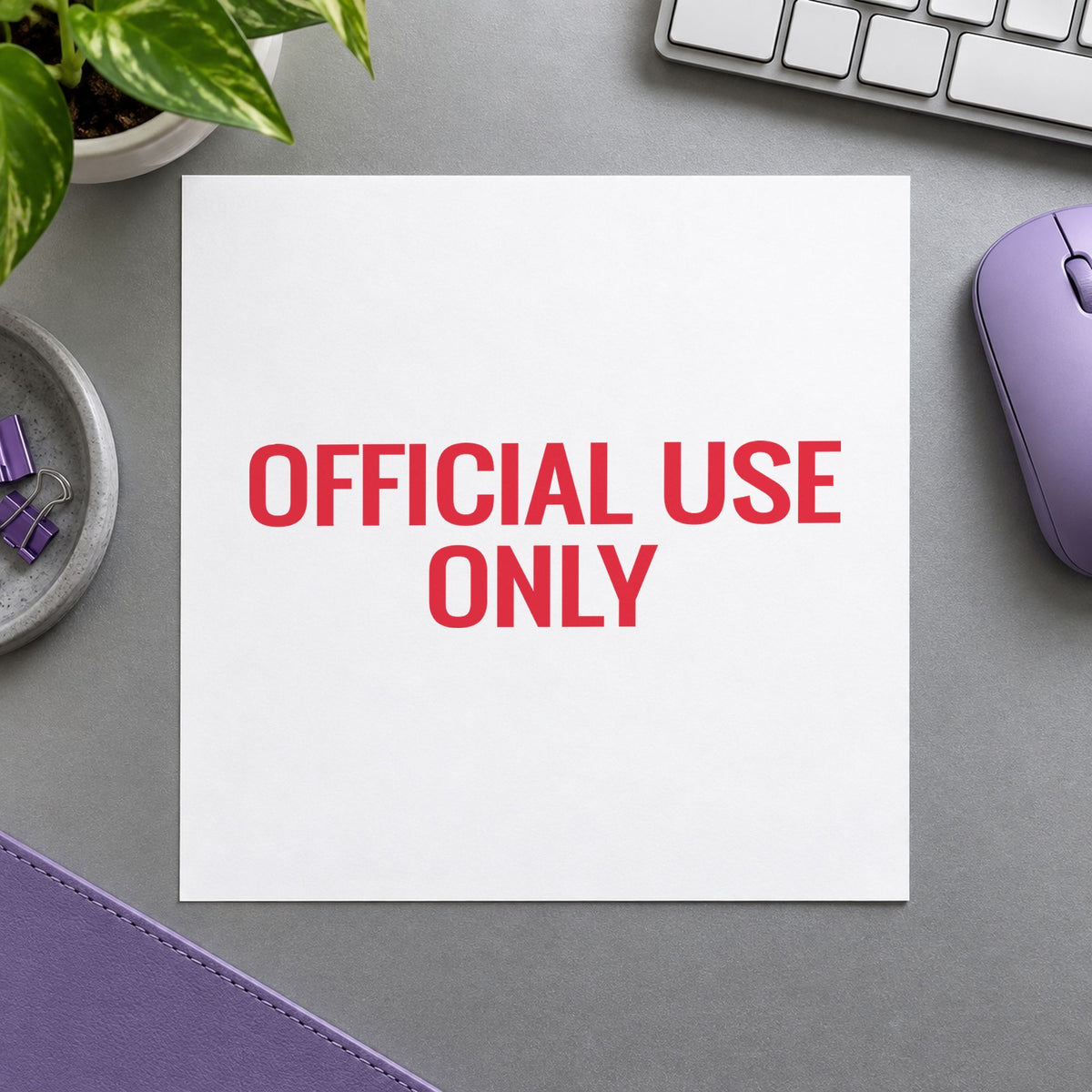 "Official use only" Xstamper pre-inked stamp beside its rectangle imprint
