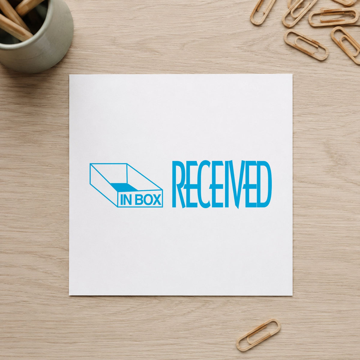"Received" stamp pressed on paper, no separate ink pad needed
