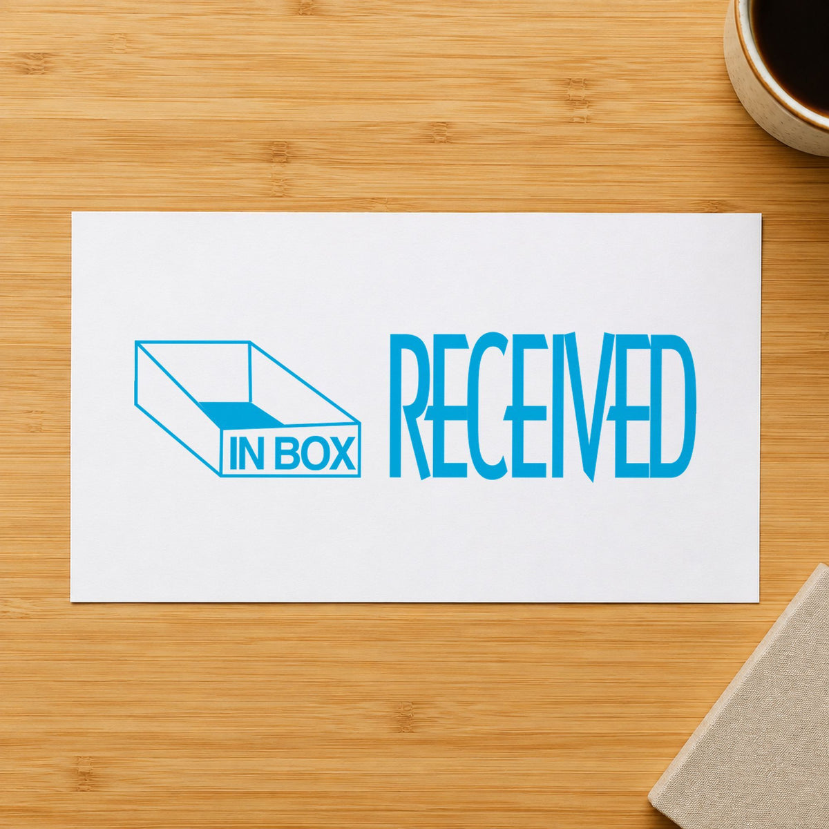 Pre-inked "Received" stamp marking paperwork in an office setting