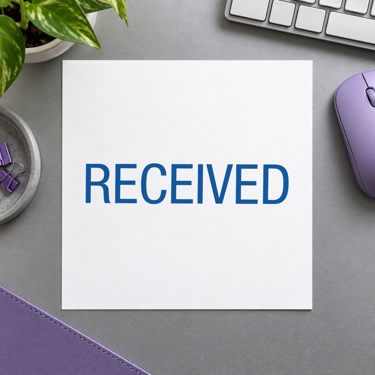 "Received" imprint sized 1/2 x 1-5/8 in on a document page