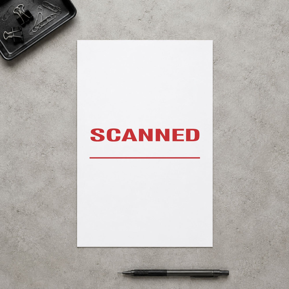 "Scanned" stamp pressed on paper, no separate ink pad needed