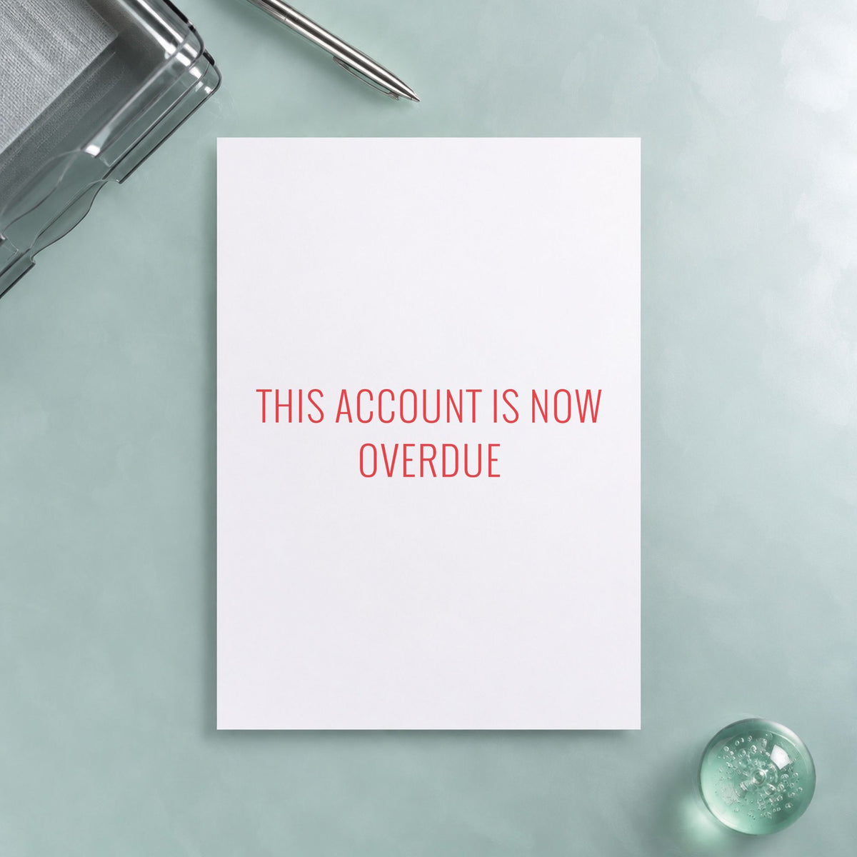 "This account is now overdue" Xstamper pre-inked stamp beside its rectangle imprint