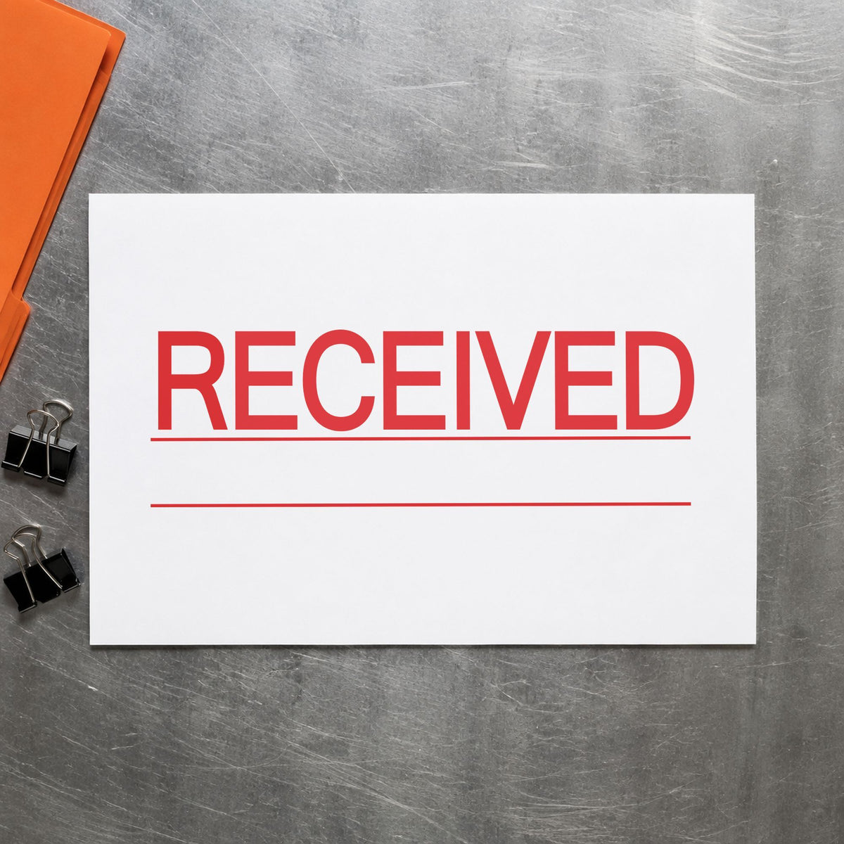 "Received" stamp pressed on paper, no separate ink pad needed