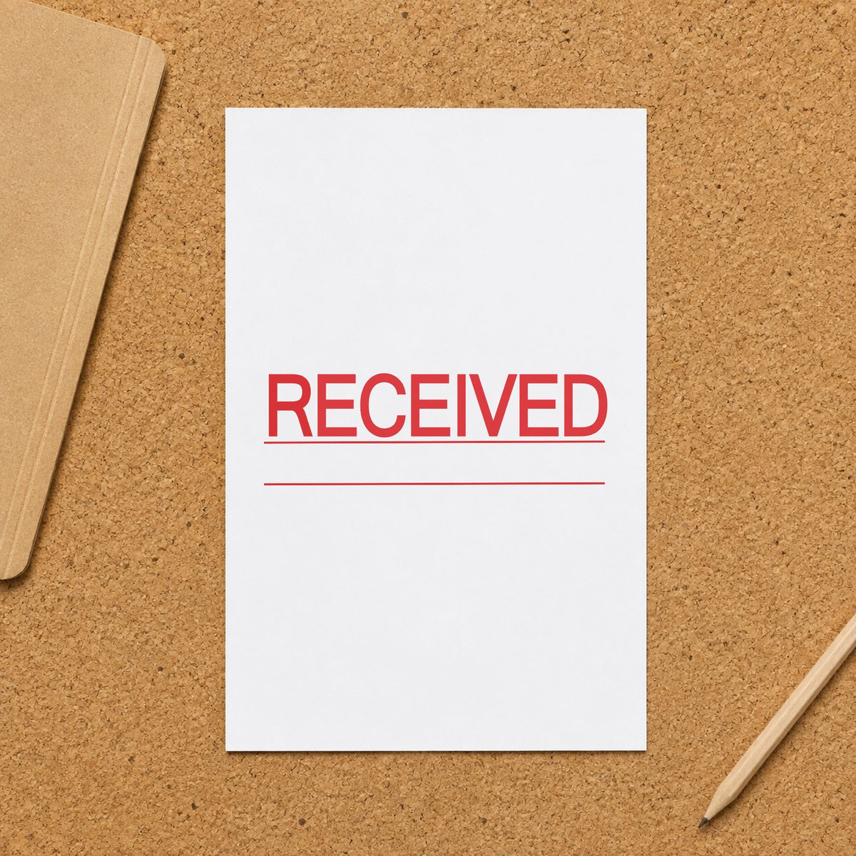 "Received" Xstamper pre-inked stamp beside its rectangle imprint