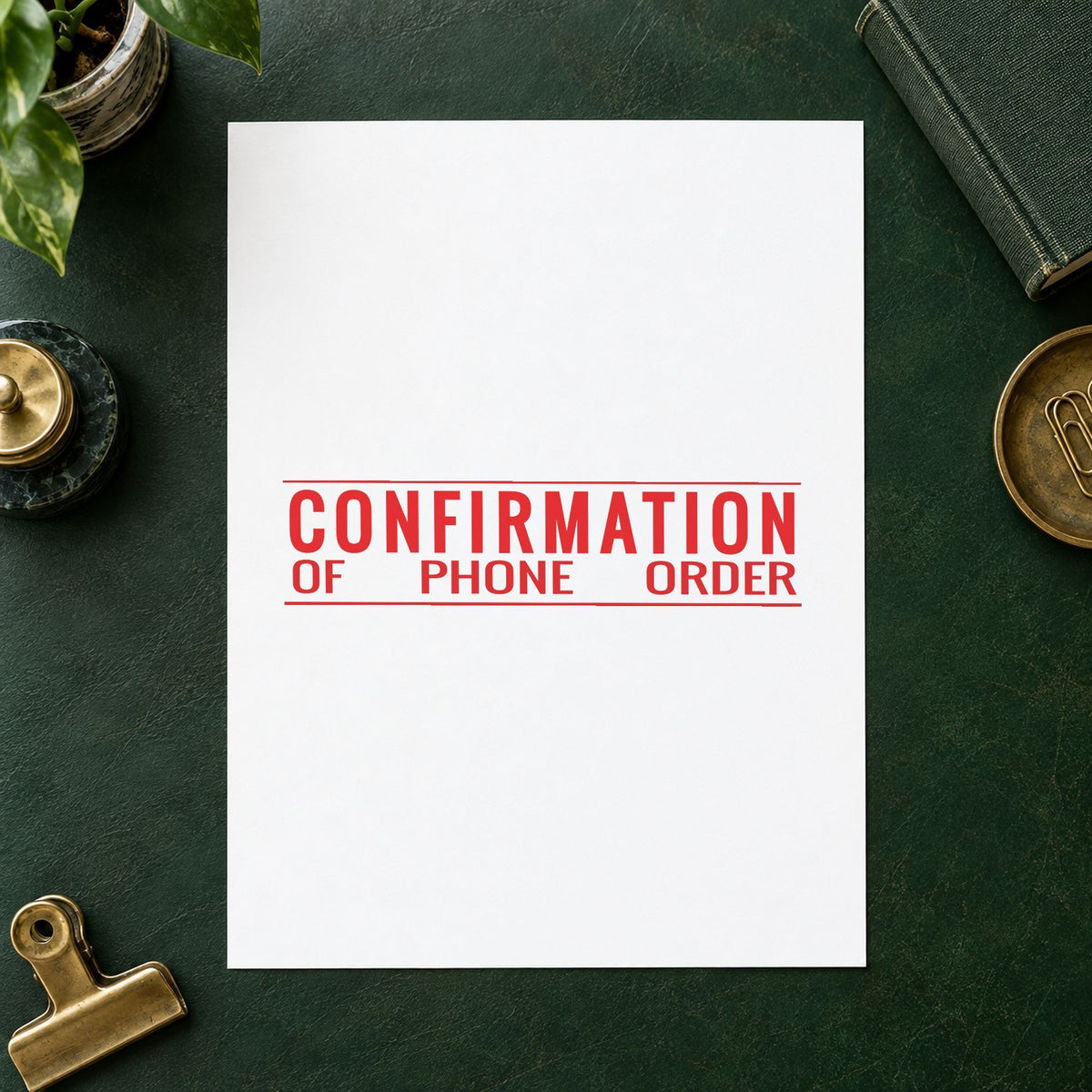 Pre-inked "Confirmation of phone order" stamp marking paperwork in an office setting
