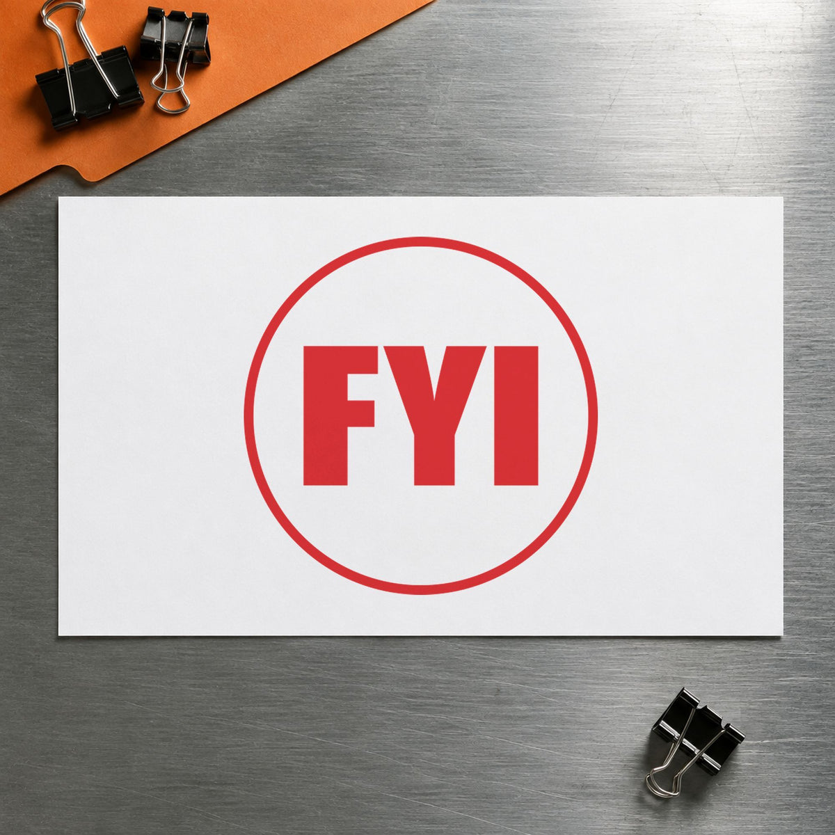 "FYI" Xstamper pre-inked stamp beside its round imprint