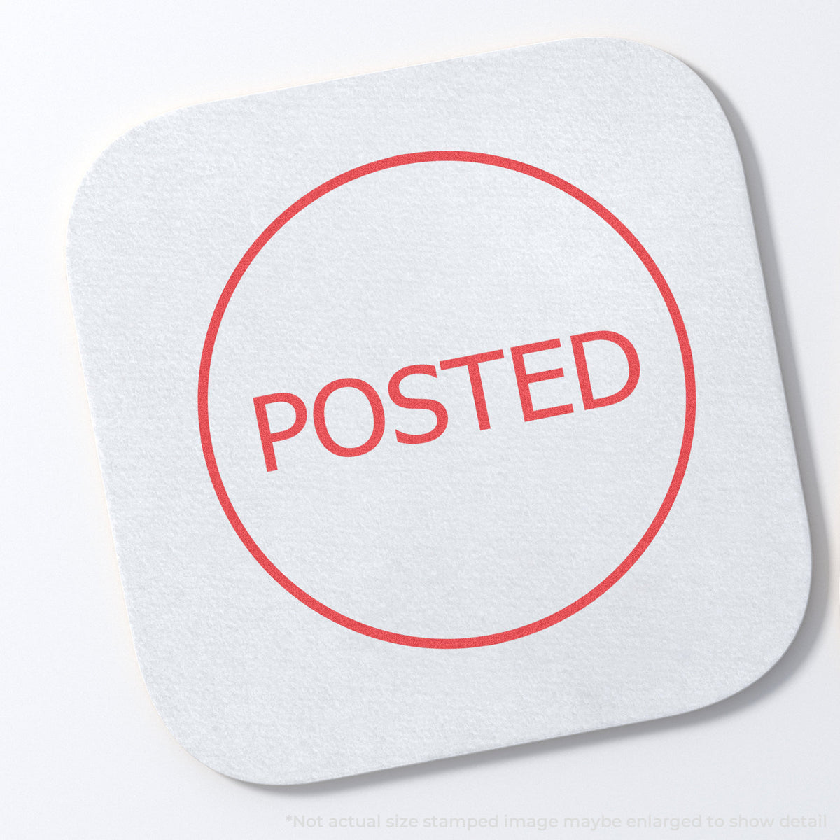 "Posted" stamp and its crisp Approximately 5/8 in diameter impression on paper