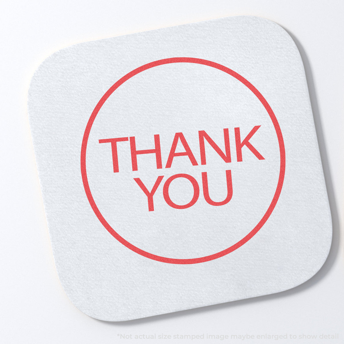 "Thank you" stamp and its crisp Approximately 5/8 in diameter impression on paper