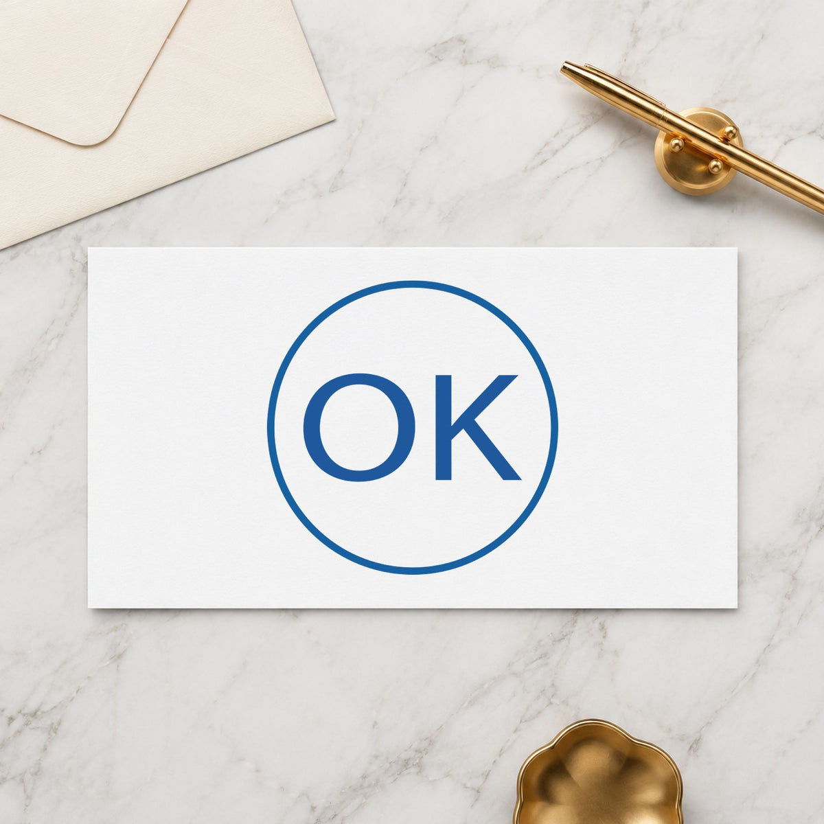 "OK" Xstamper stamp in use on paper, 5/8 in diameter round imprint