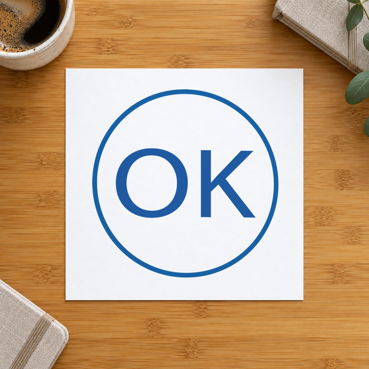 "OK" imprint sized 5/8 in diameter on a document page