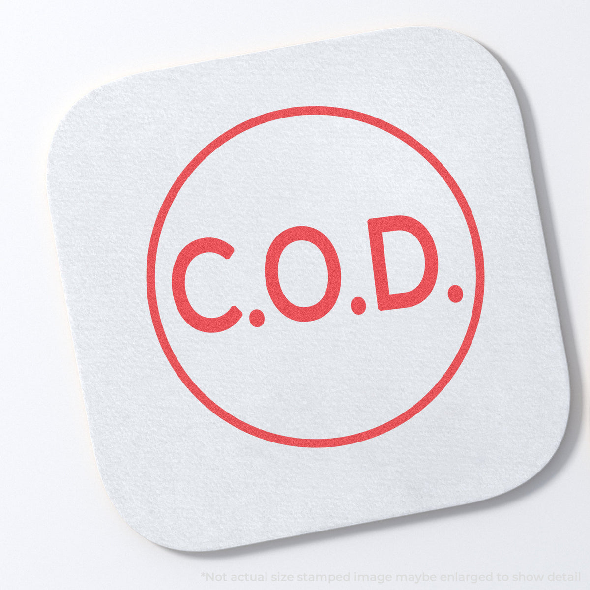 "C.O.D." stamp and its crisp Approximately 5/8 in diameter impression on paper