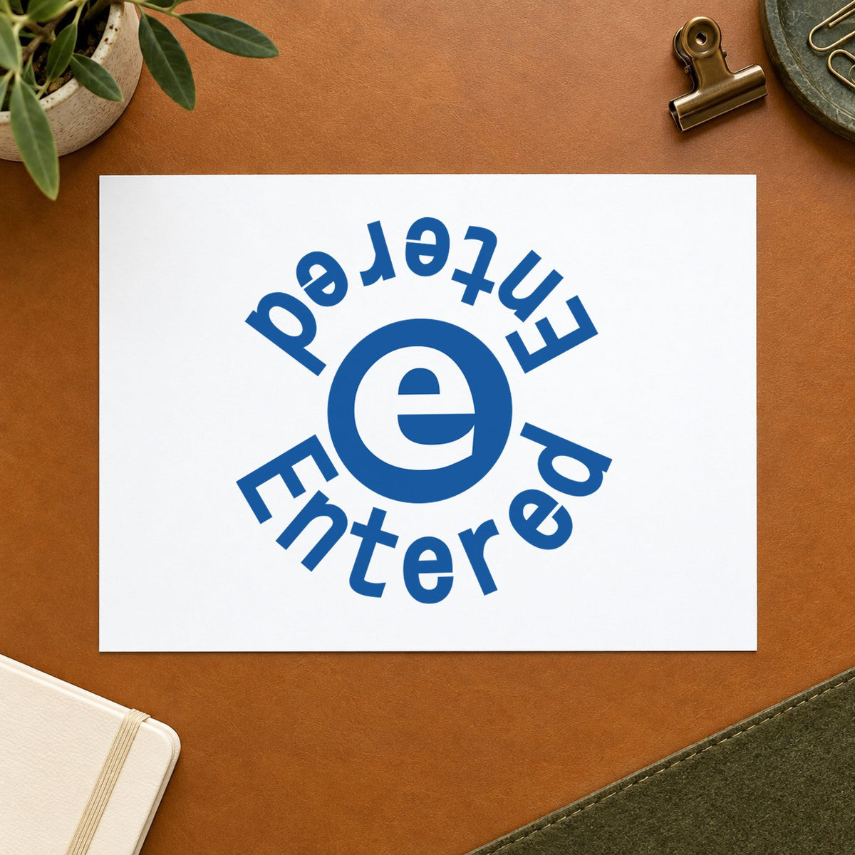 Close view of the "Entered" mark left by Xstamper No. 11423