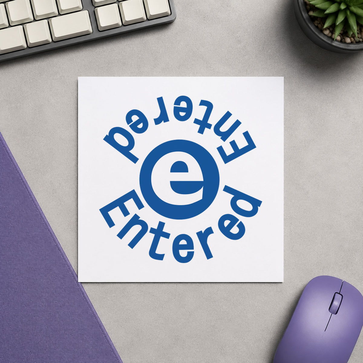 "Entered" stamp pressed on paper, no separate ink pad needed