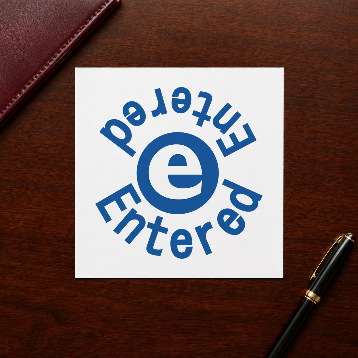 "Entered" imprint sized Approximately 5/8 in diameter on a document page