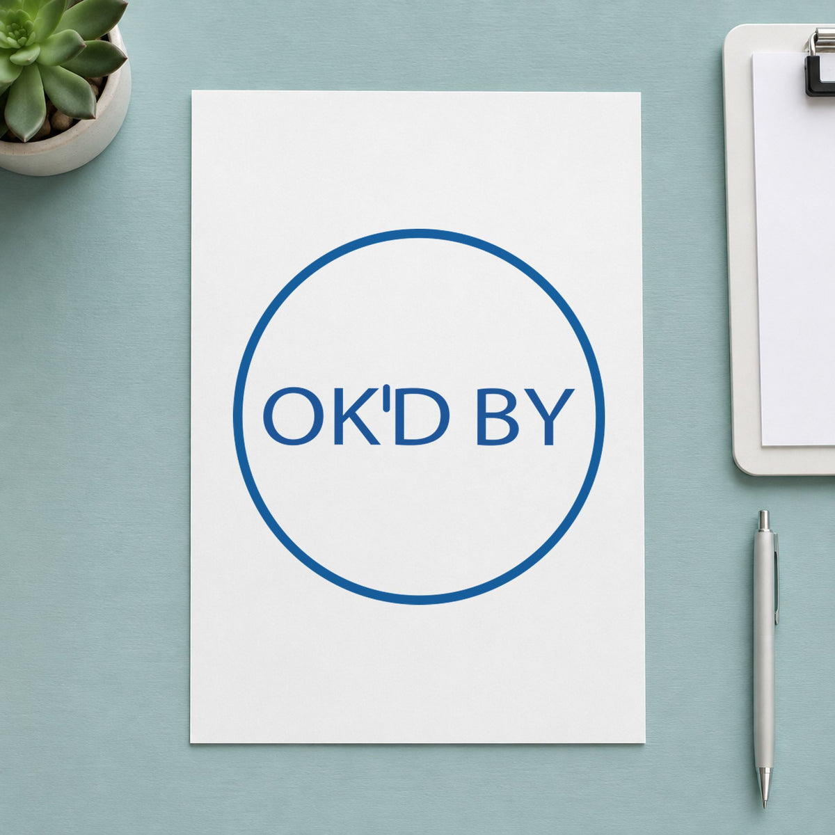 "OK'd by" Xstamper stamp at work on everyday office paperwork